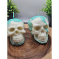 Pair skull candles by CrystalCloud Company