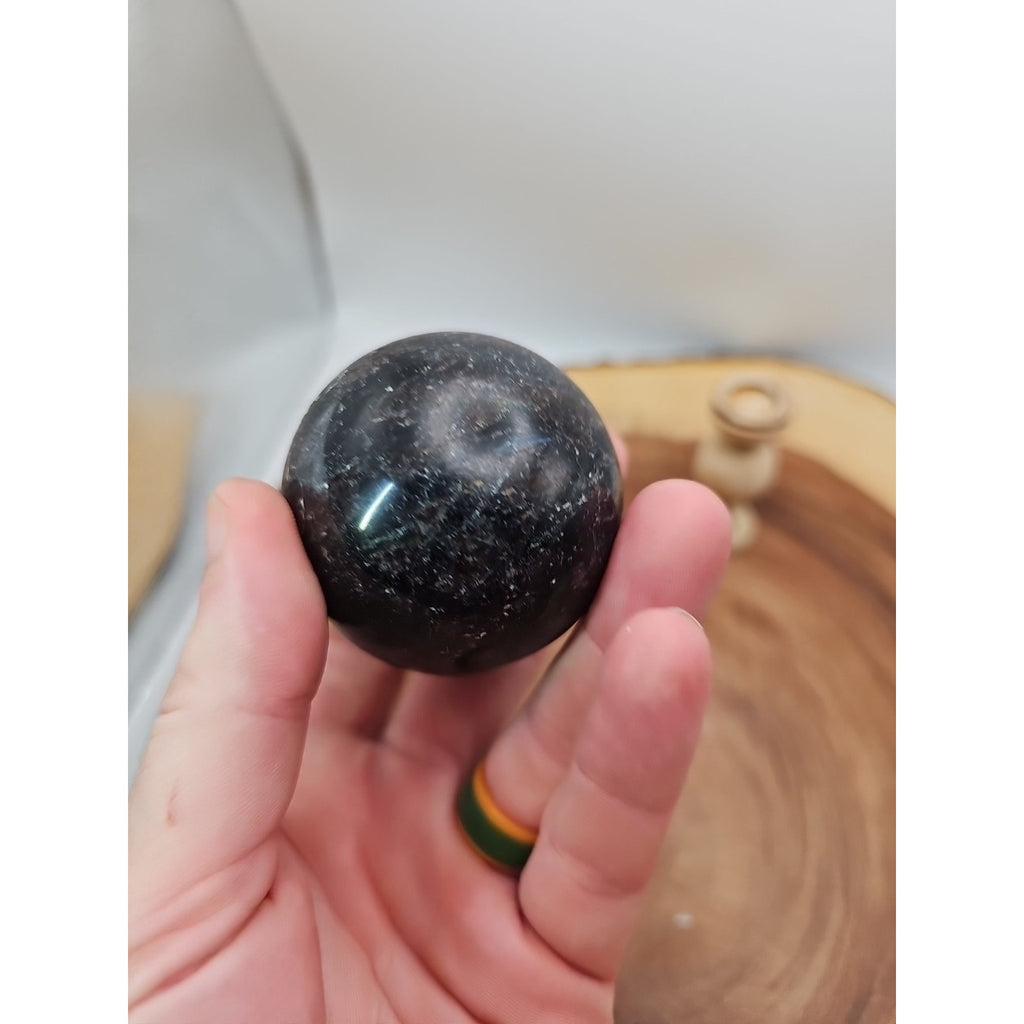 Arfvedsonite Garnet Sphere 276g With Stand by CrystalCloud Company