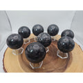 Quartz Crystal Sphere 50mm 1 Each Arfvedsonite Garnet Flash by CrystalCloud Company