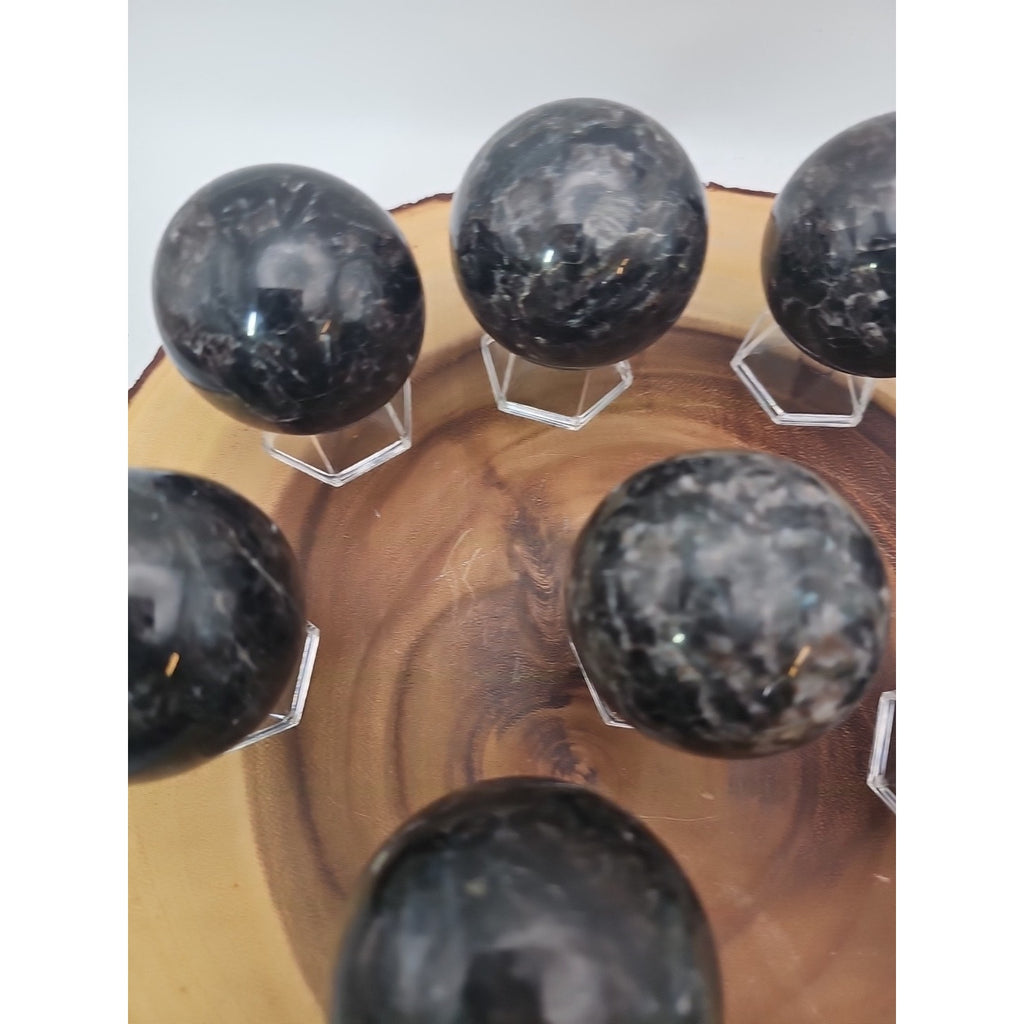Quartz Crystal Sphere 50mm 1 Each Arfvedsonite Garnet Flash by CrystalCloud Company