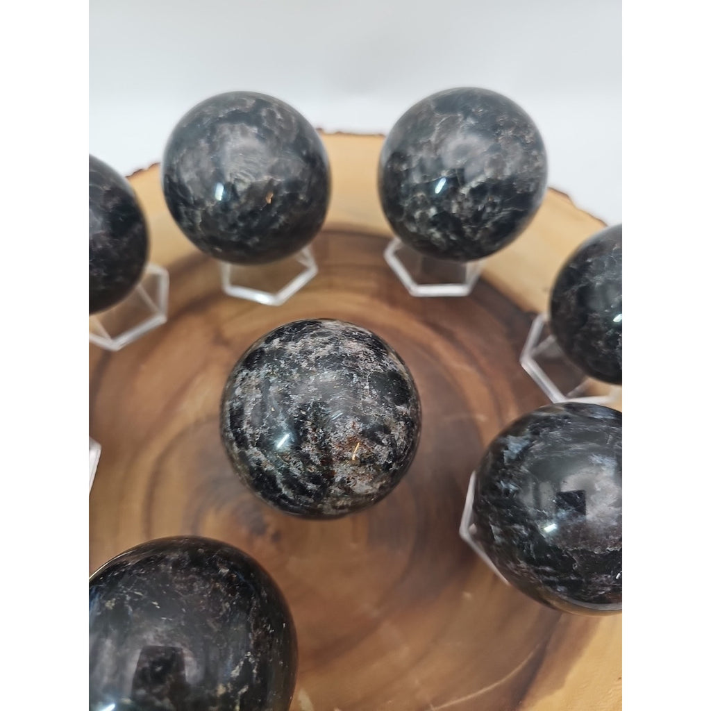 Quartz Crystal Sphere 50mm 1 Each Arfvedsonite Garnet Flash by CrystalCloud Company