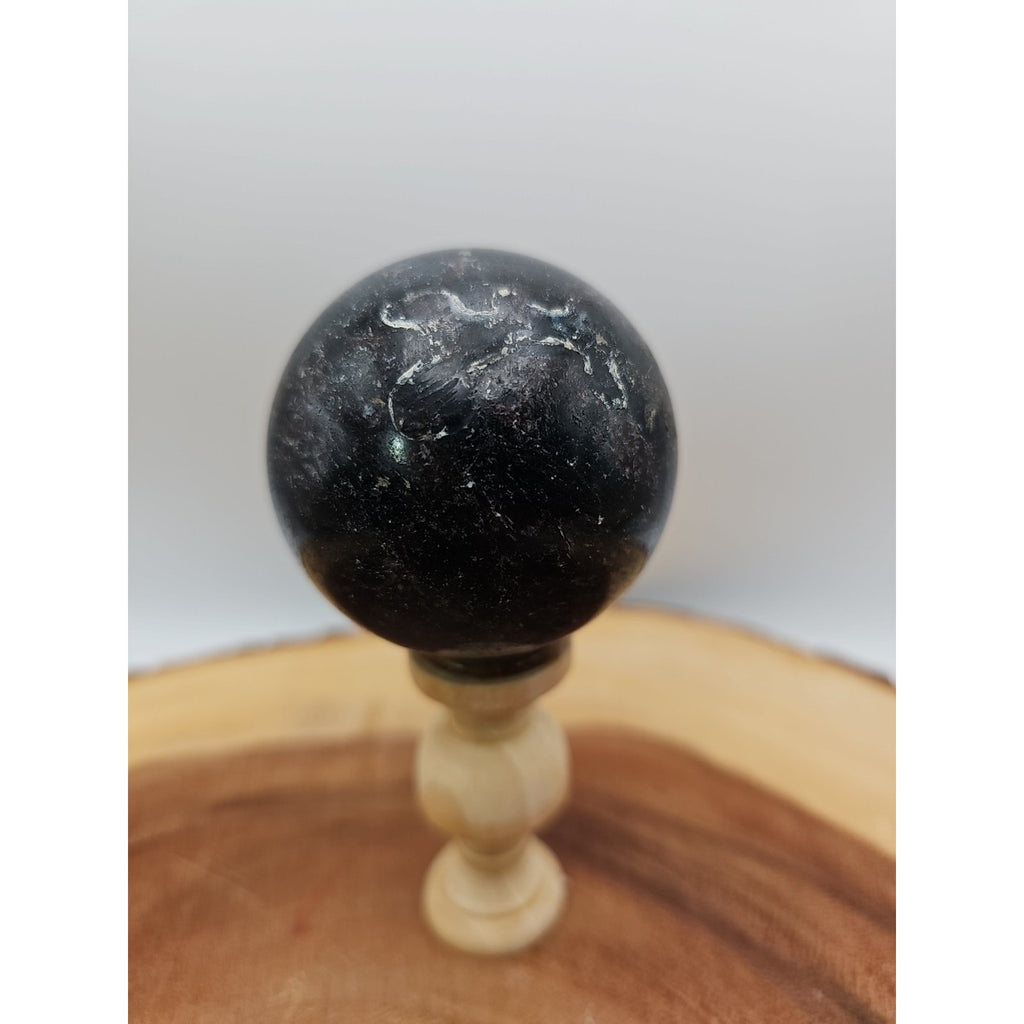 Arfvedsonite Garnet Sphere 276g With Stand by CrystalCloud Company
