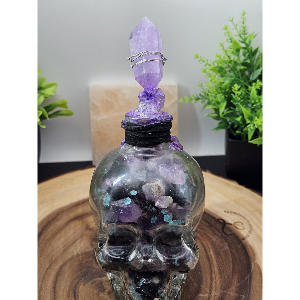 Glass Skull with Amethyst, Obsidian & UV Stones by CrystalCloud Company