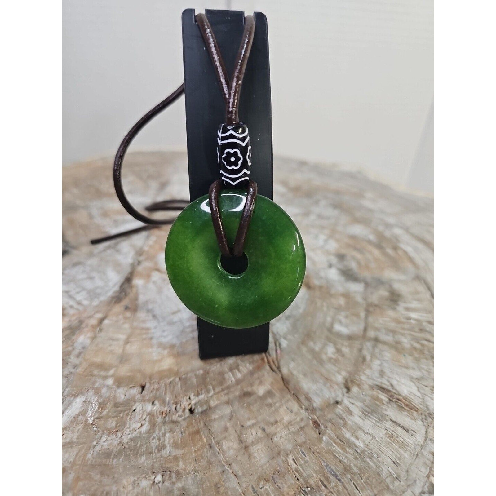 jade necklace Absolutely. Beautiful. With leather Strap by CrystalCloud Company