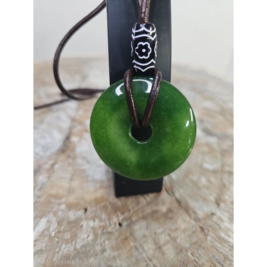 jade necklace Absolutely. Beautiful. With leather Strap by CrystalCloud Company