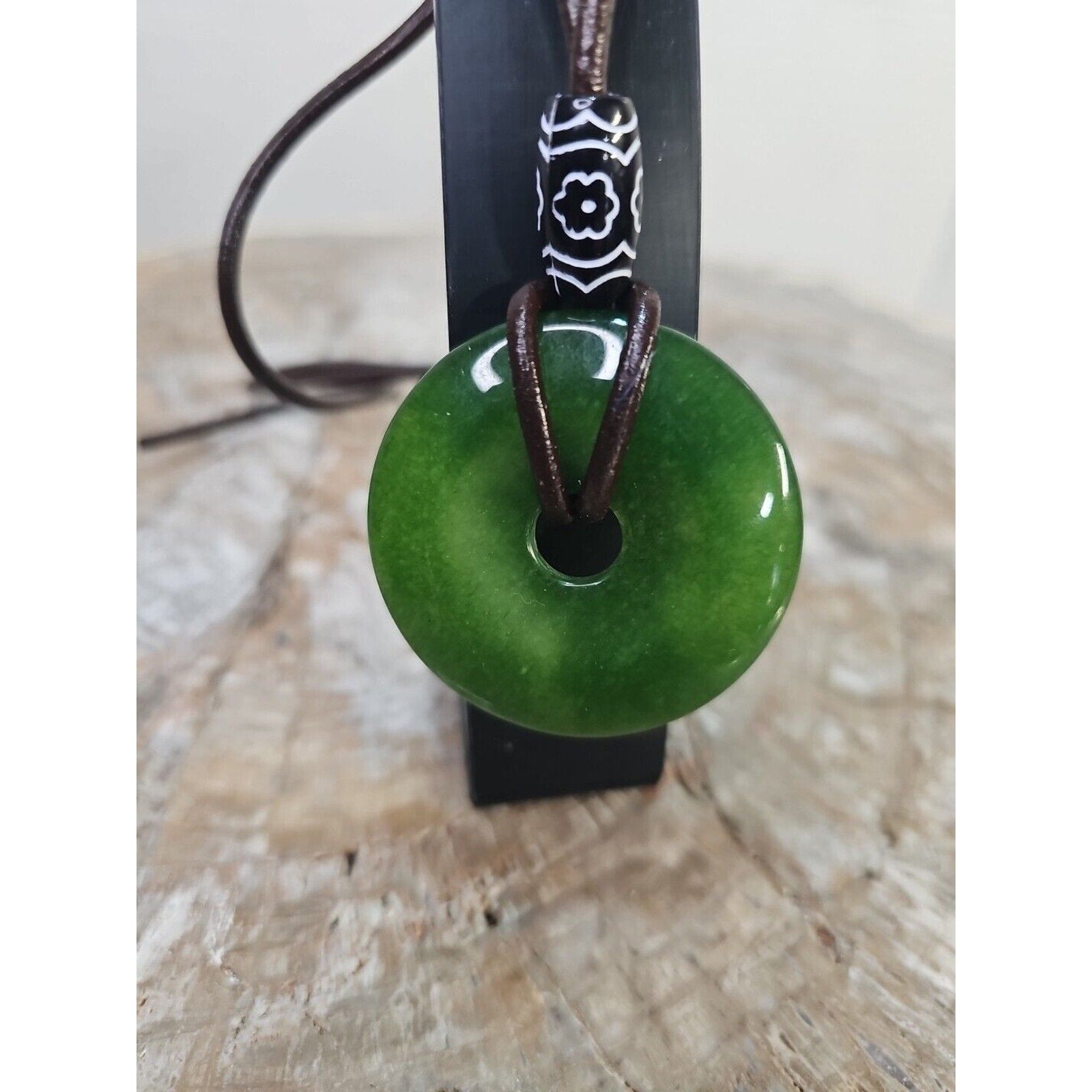 jade necklace Absolutely. Beautiful. With leather Strap by CrystalCloud Company