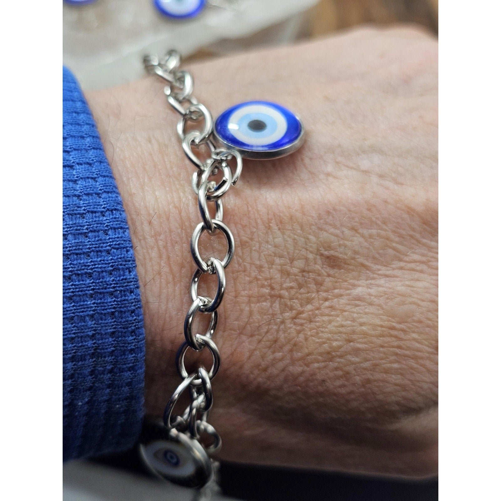Evil eye bracelet and earrings by CrystalCloud Company