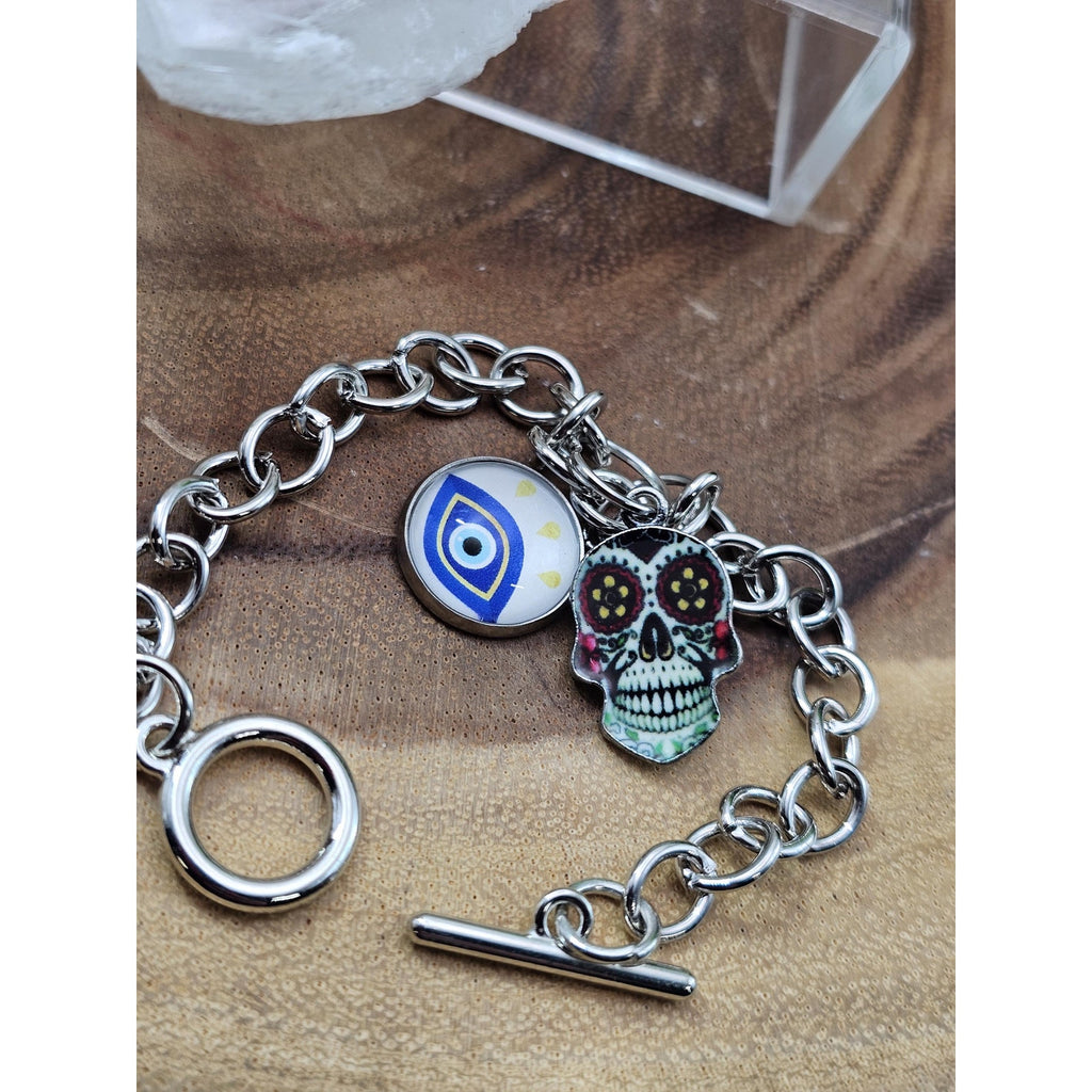 Evil eye bracelet and earrings by CrystalCloud Company