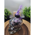 Glass Skull with Amethyst, Obsidian & UV Stones by CrystalCloud Company