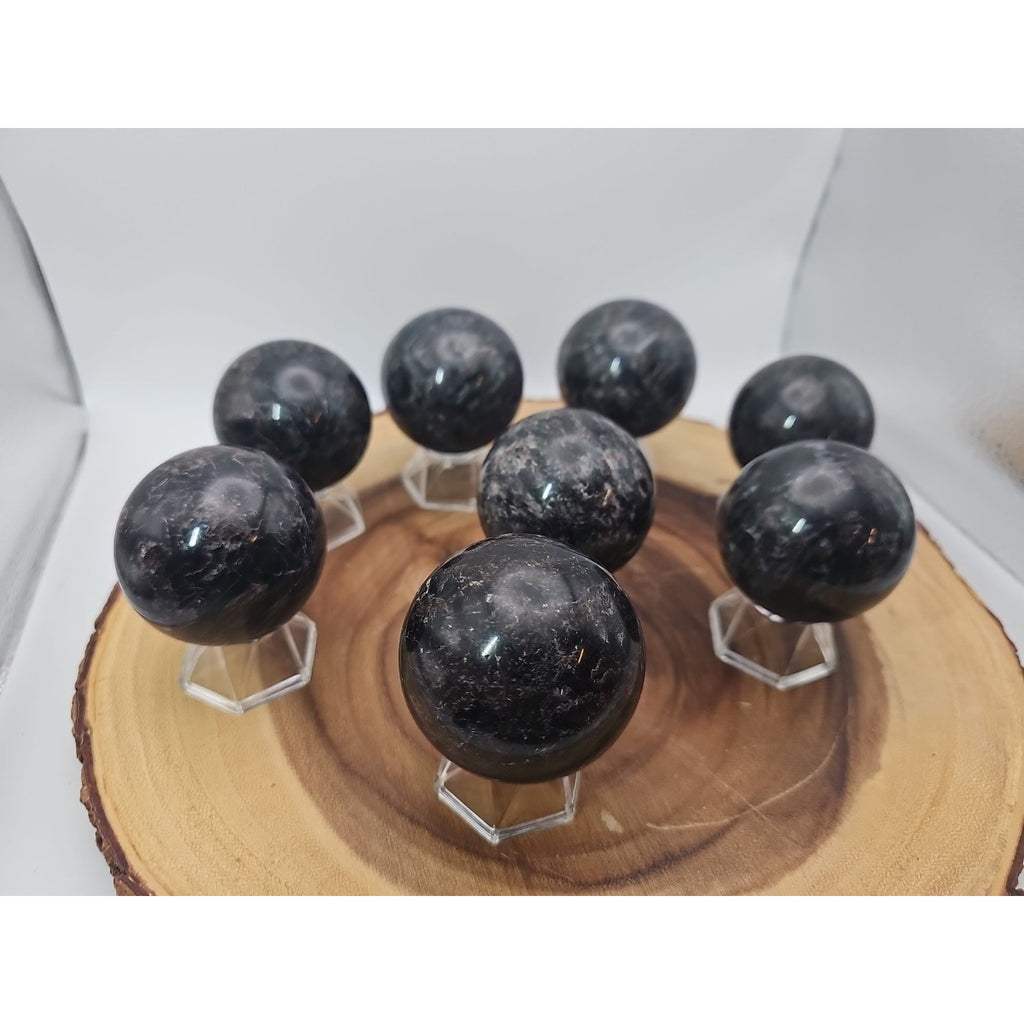 Quartz Crystal Sphere 50mm 1 Each Arfvedsonite Garnet Flash by CrystalCloud Company