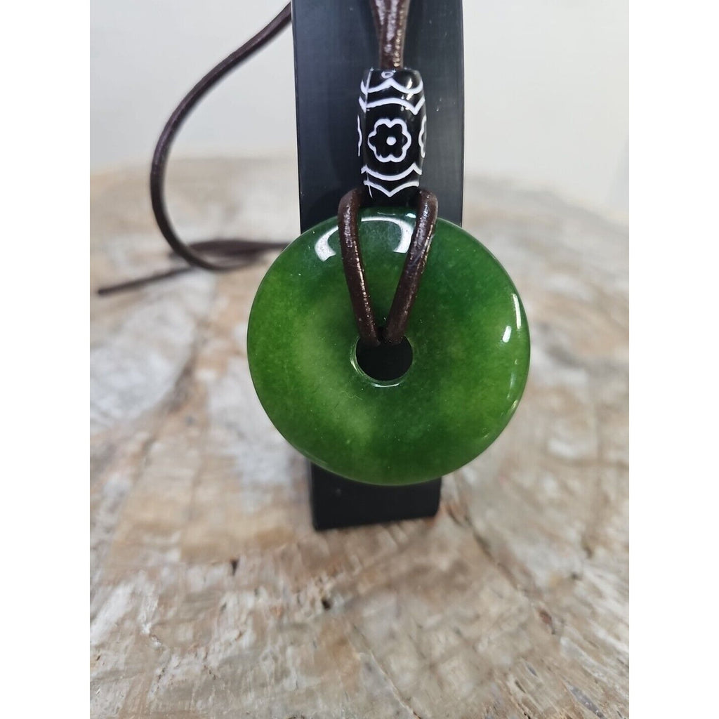 jade necklace Absolutely. Beautiful. With leather Strap by CrystalCloud Company