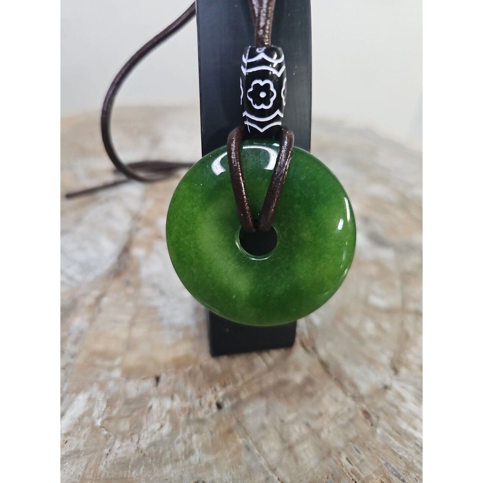 jade necklace Absolutely. Beautiful. With leather Strap by CrystalCloud Company