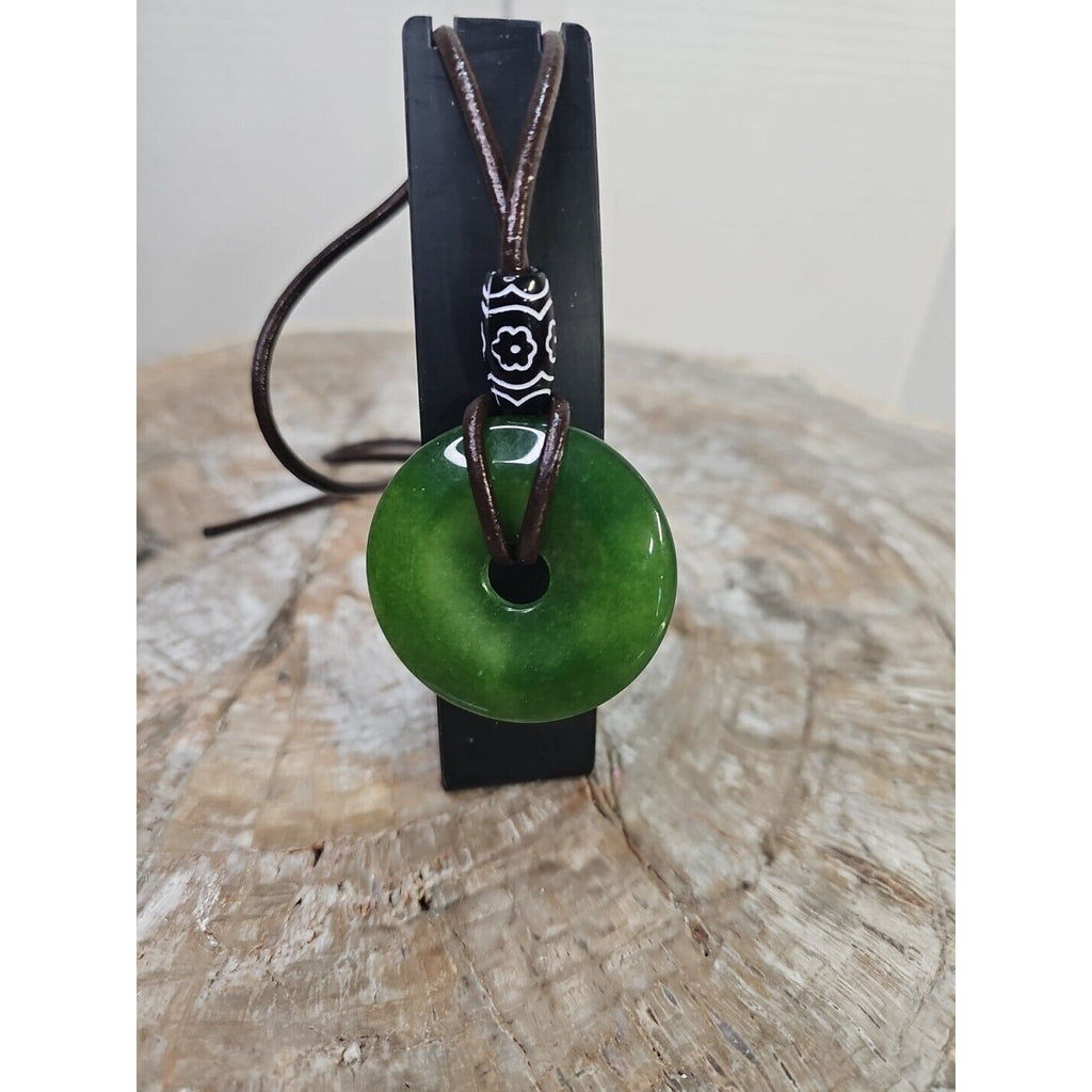 jade necklace Absolutely. Beautiful. With leather Strap by CrystalCloud Company