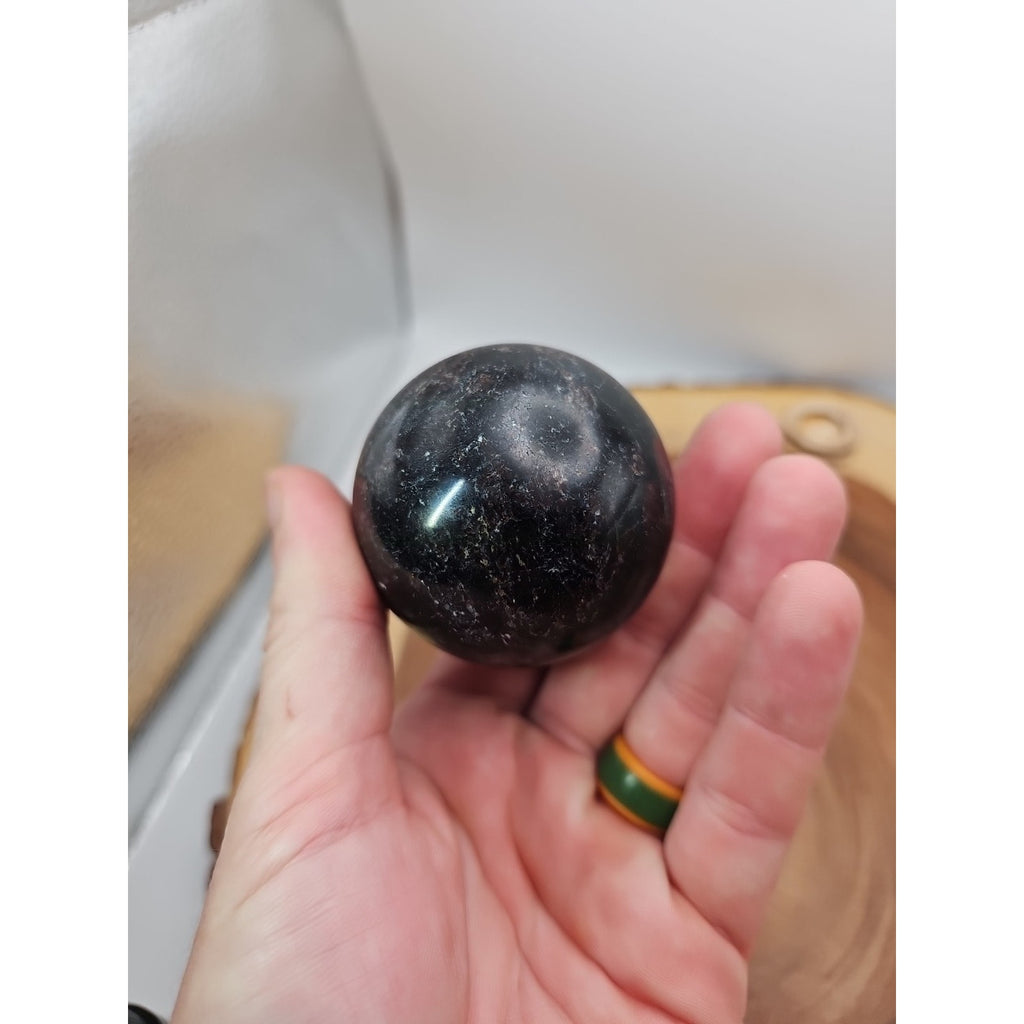 Arfvedsonite Garnet Sphere 276g With Stand by CrystalCloud Company